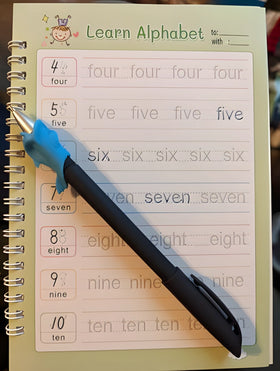 Review / Practice Notebook with alphabet learning pages and a pen with grip on top