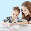 Happy mother watching young daughter practice handwriting using TinkerMindz 3D groove technology workbook with ergonomic pen grip for proper letter formation